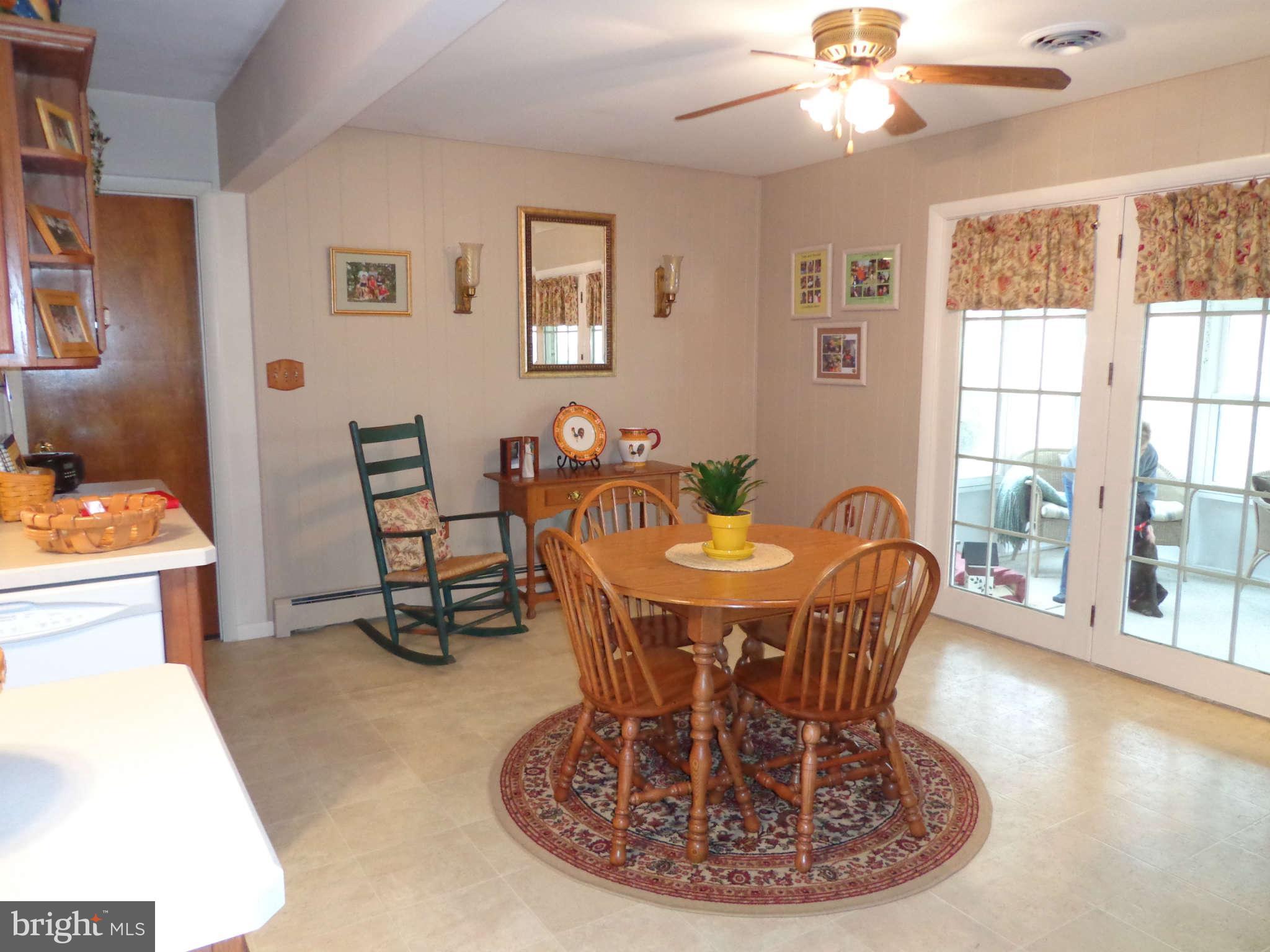 2831 Pleasantville Road Fallston, MD 21047 - Photo 11 of 24 Kitchen with french doors to enclosed sunroom