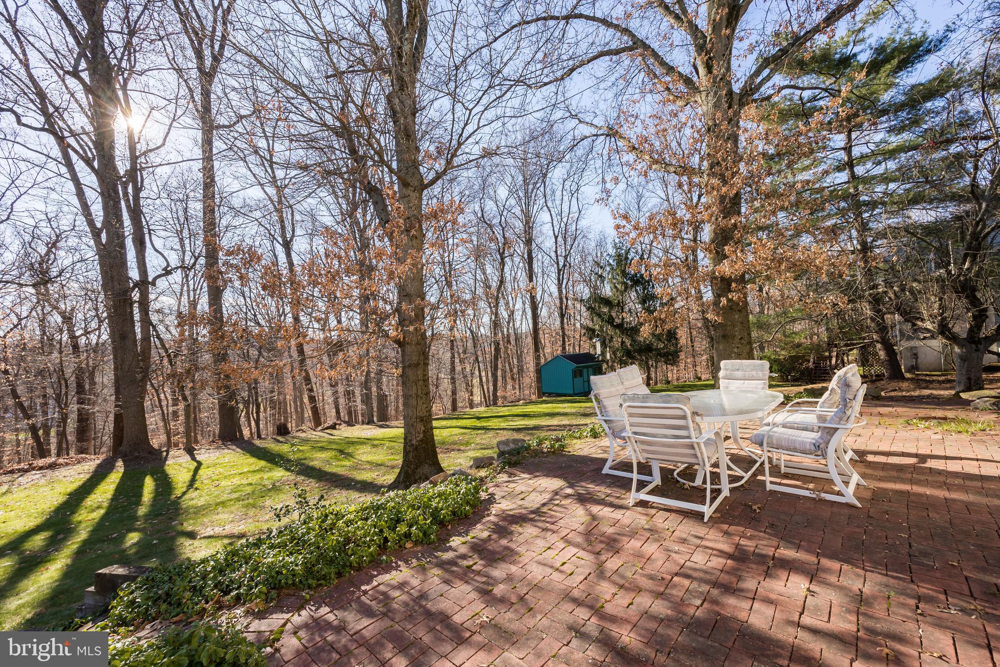 468 Rocksville Road Holland, PA 18966 - Photo 22 of 31 a view of a bench in a backyard