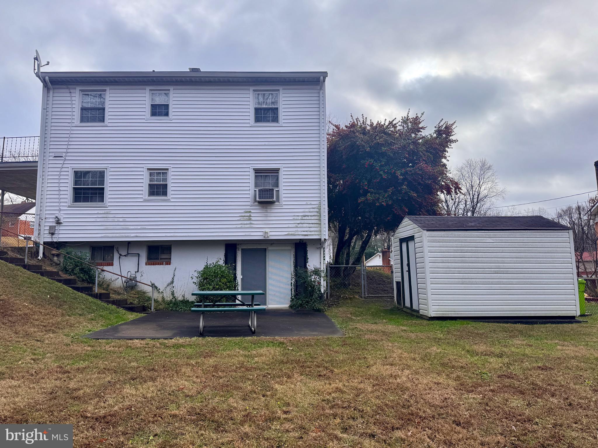 2112 Patrick Street Woodbridge, VA 22191 - Photo 12 of 65 a front view of a house with a garden