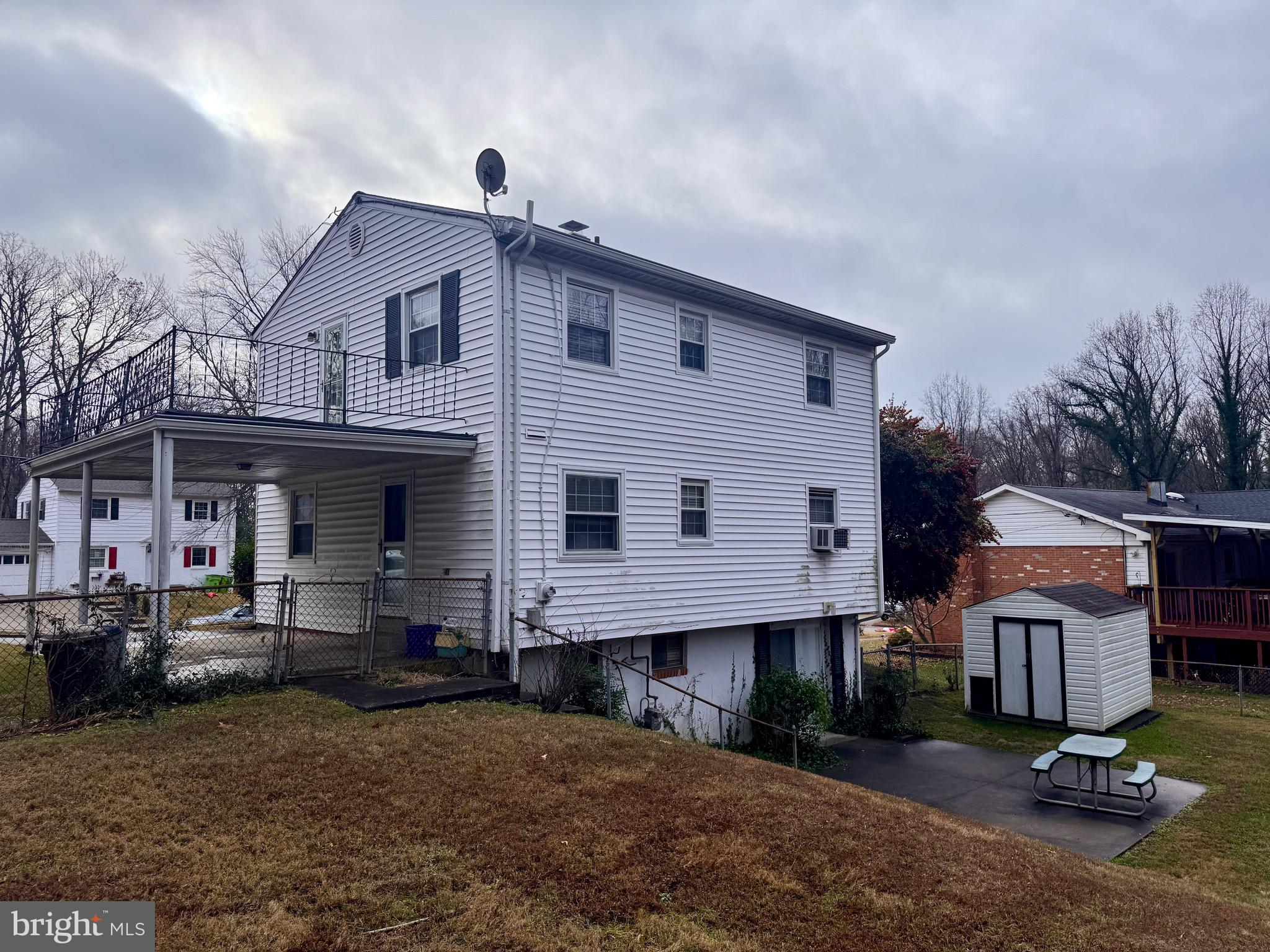 2112 Patrick Street Woodbridge, VA 22191 - Photo 13 of 65 a front view of a house with a yard