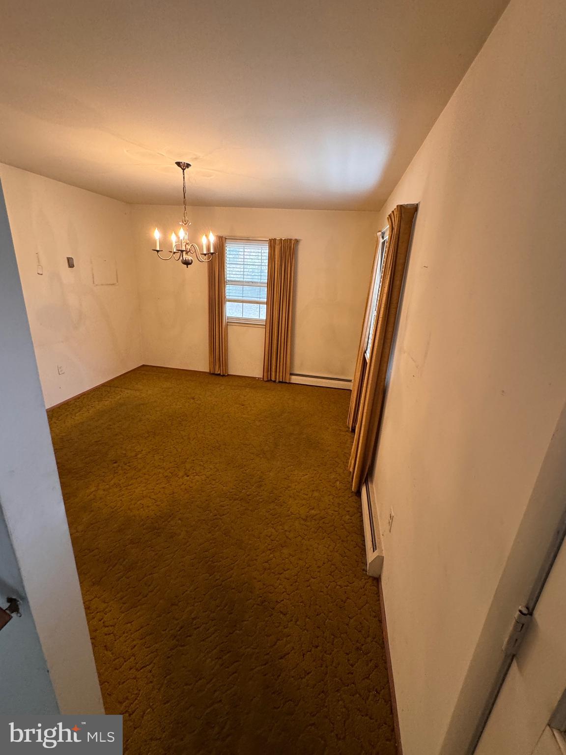 2112 Patrick Street Woodbridge, VA 22191 - Photo 26 of 65 a view of empty room with window and wooden floor