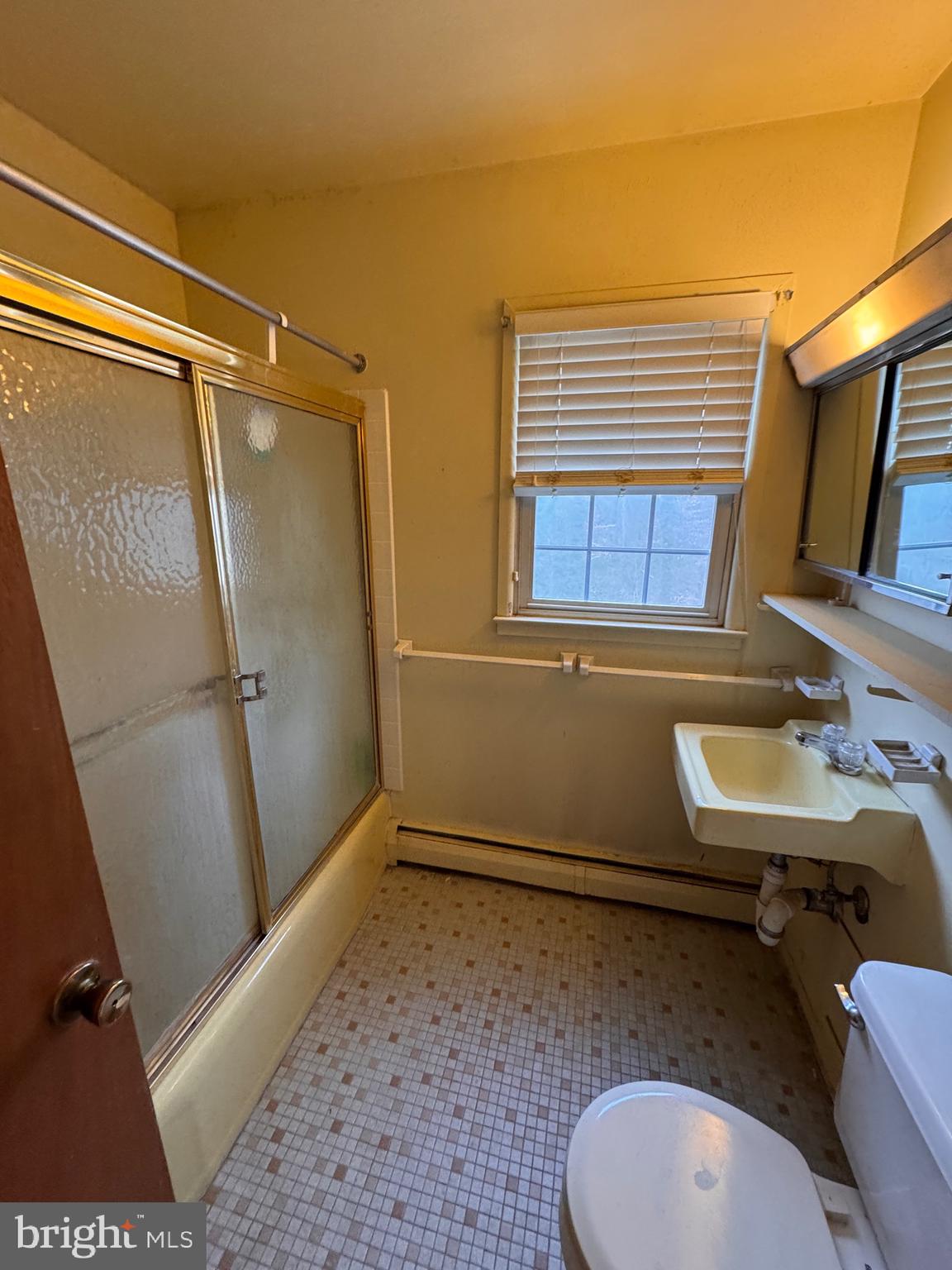 2112 Patrick Street Woodbridge, VA 22191 - Photo 52 of 65 a bathroom with a sink a toilet and shower