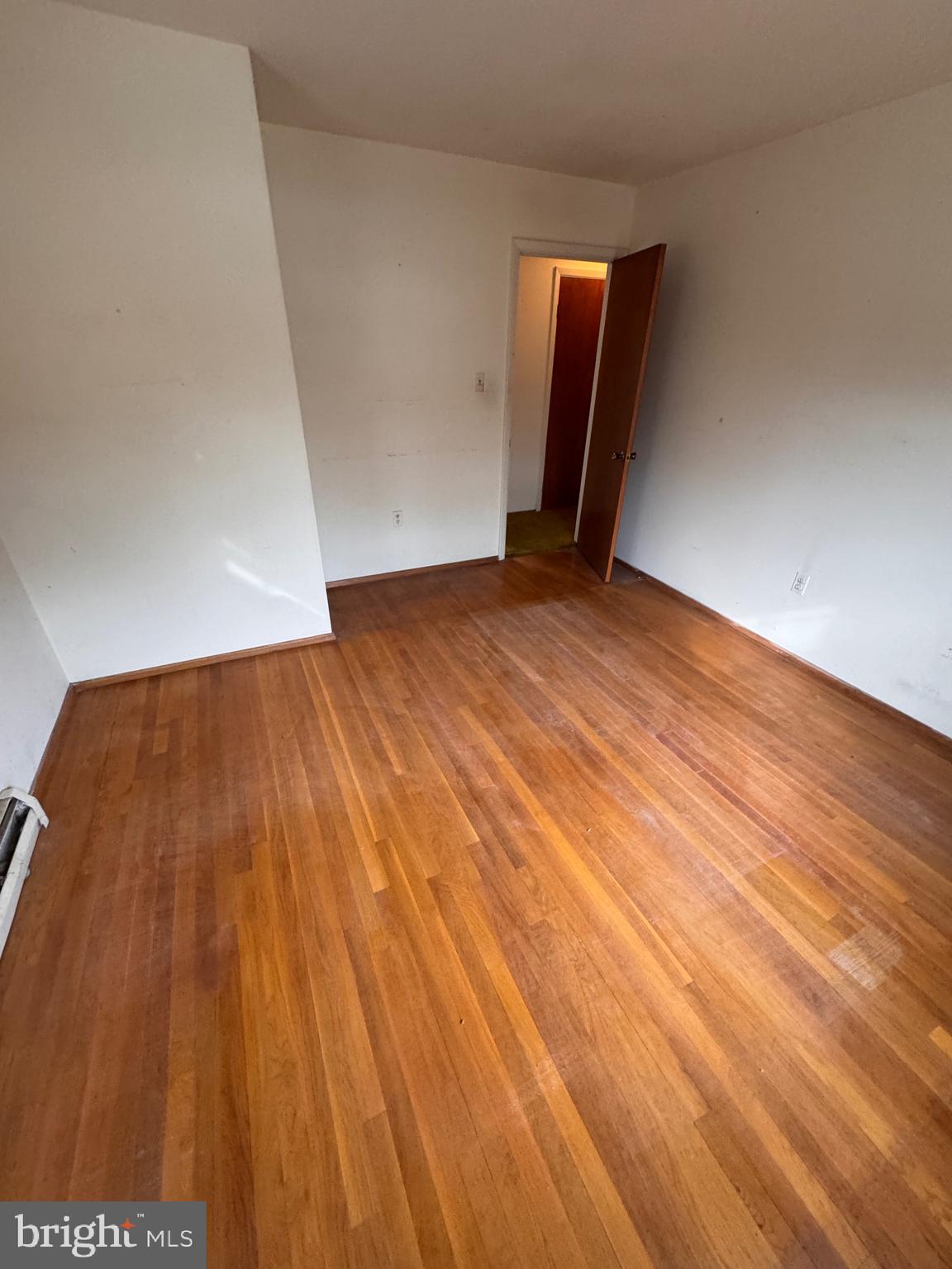 2112 Patrick Street Woodbridge, VA 22191 - Photo 55 of 65 a view of empty room with wooden floor