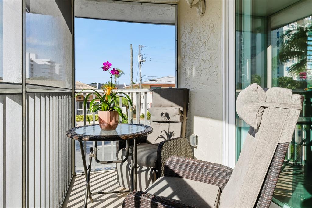 1450 North Riverside Drive, Unit 201 Pompano Beach, FL 33062 - Photo 22 of 30 a view of a dining room with furniture and a potted plant
