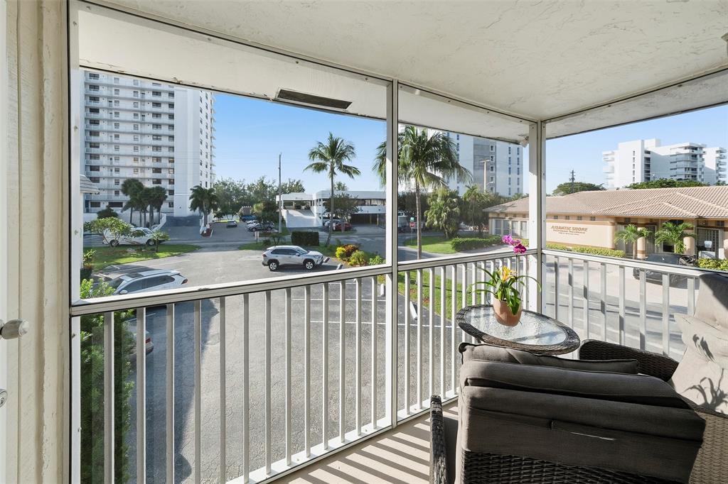 1450 North Riverside Drive, Unit 201 Pompano Beach, FL 33062 - Photo 23 of 30 a view of balcony with couch