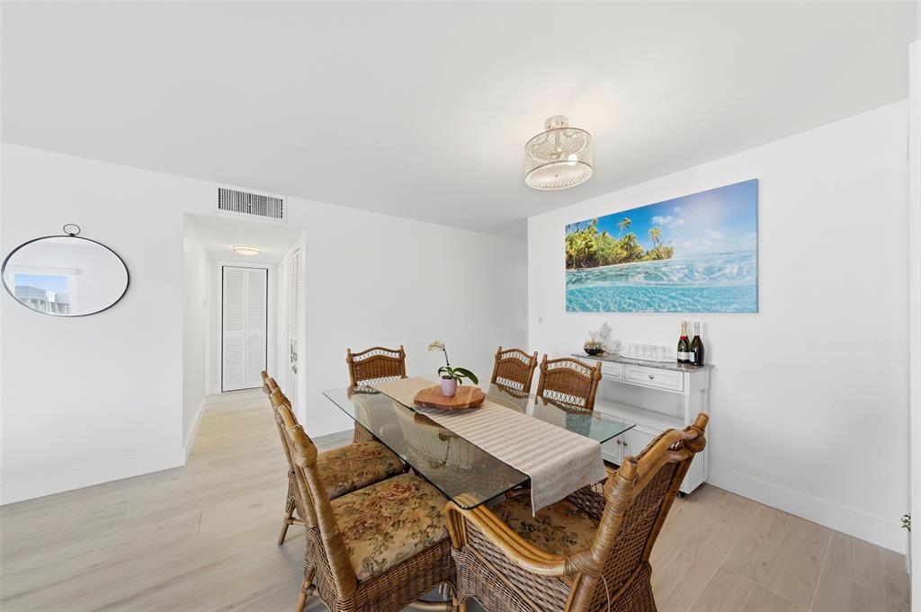 1450 North Riverside Drive, Unit 201 Pompano Beach, FL 33062 - Photo 5 of 30 a dining room with furniture and window
