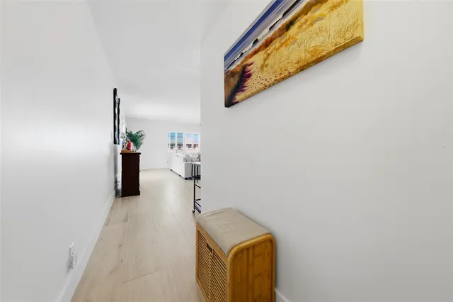 a view of a hallway with staircase