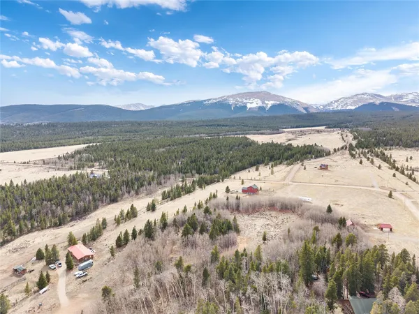 a view of lake with mountain in the background