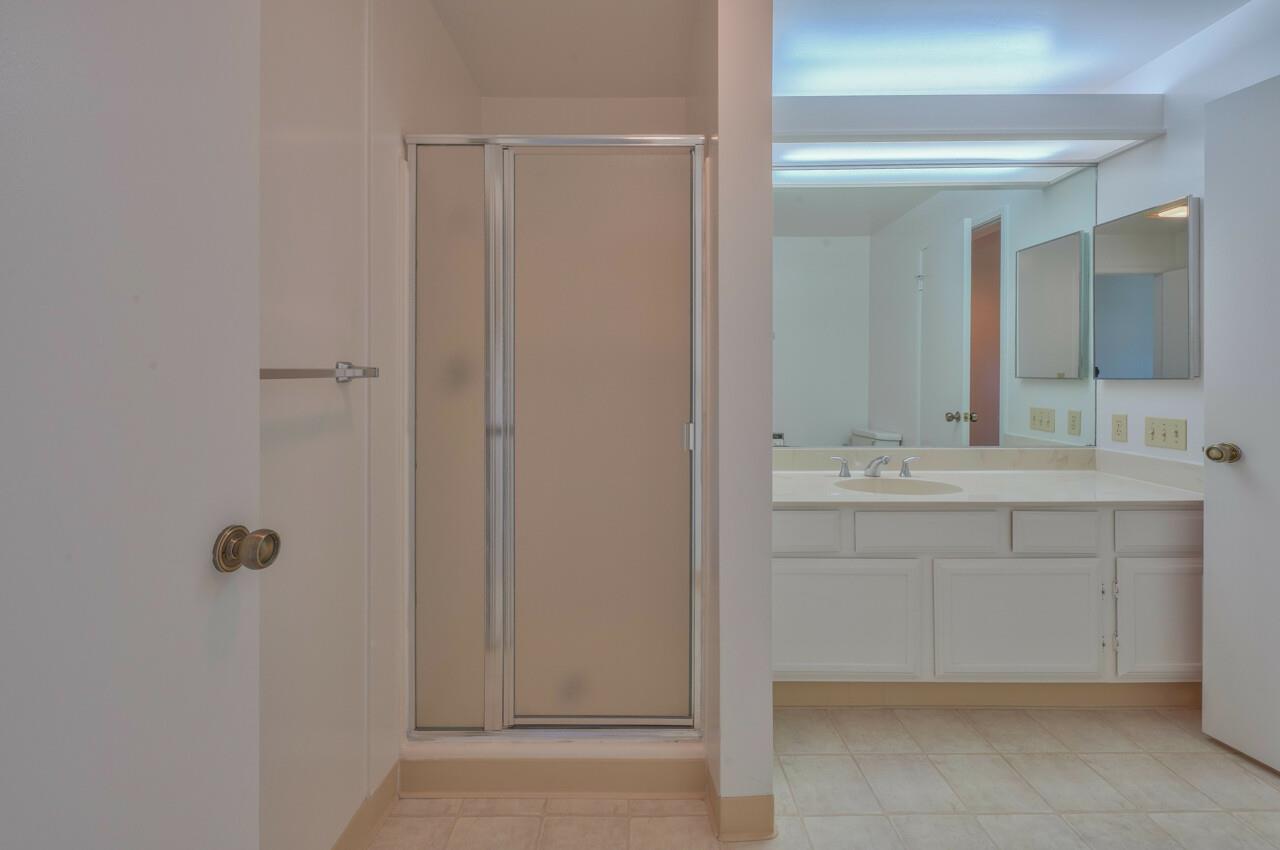 18 Shepherds Knoll Road Monterey, CA 93940 - Photo 24 of 28 a bathroom with a sink and a mirror