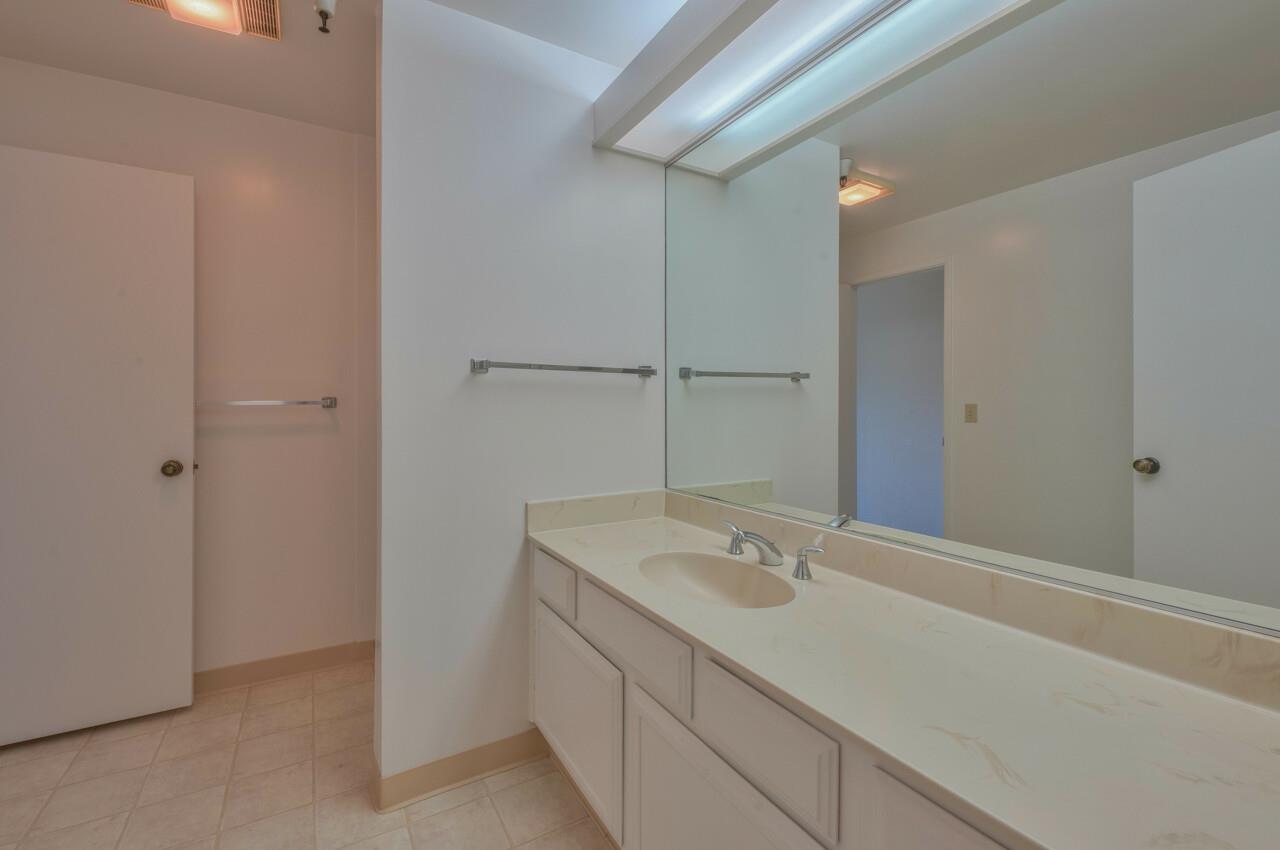 18 Shepherds Knoll Road Monterey, CA 93940 - Photo 25 of 28 a bathroom with a sink and a mirror
