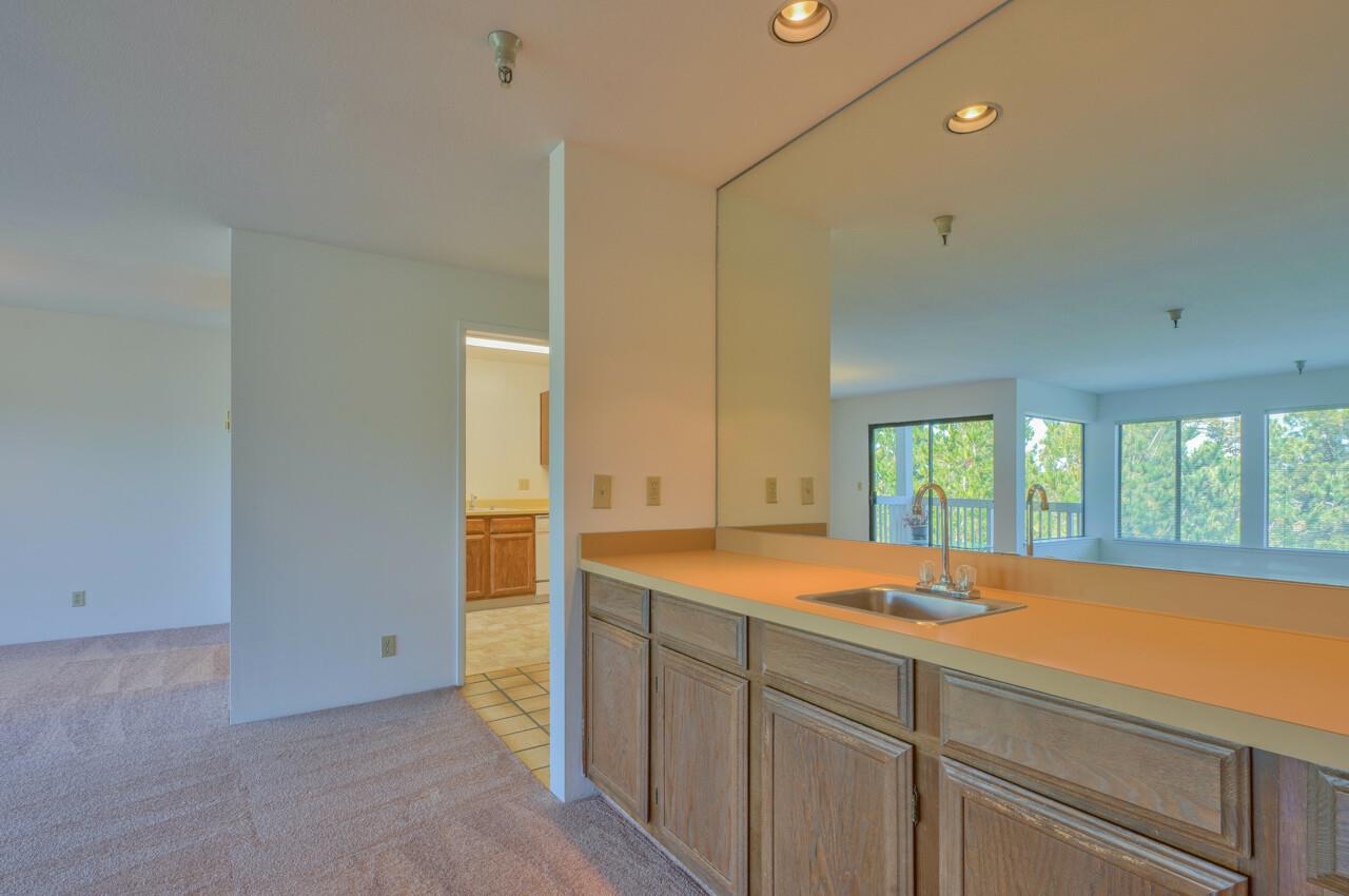 18 Shepherds Knoll Road Monterey, CA 93940 - Photo 7 of 28 a view of a kitchen with a sink and dishwasher