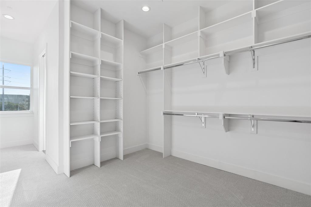 3040 ChImes Street Dallas, TX 75219 - Photo 21 of 38 a view of an empty walk in closet