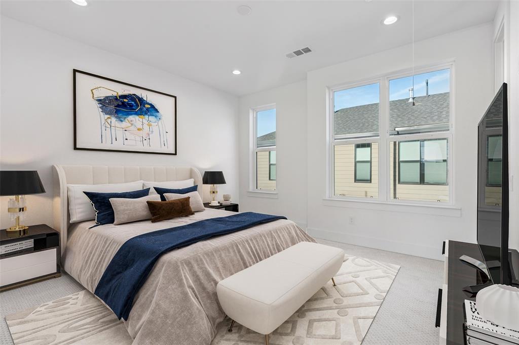 3040 ChImes Street Dallas, TX 75219 - Photo 24 of 38 a bedroom with bed and a window