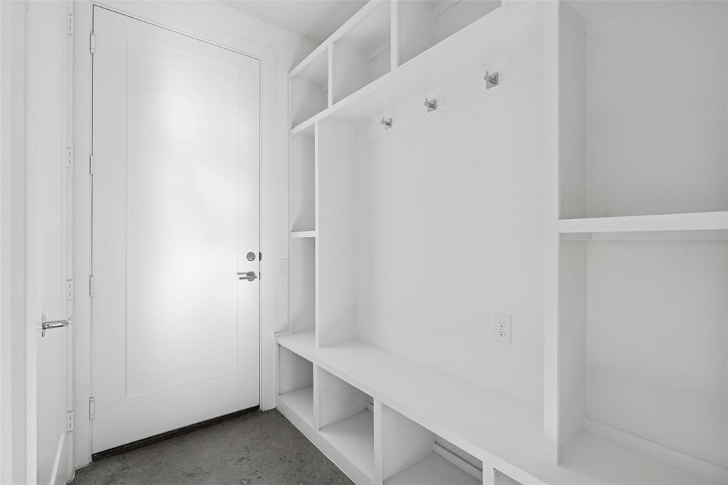 3040 ChImes Street Dallas, TX 75219 - Photo 29 of 38 a view of an empty walk in closet