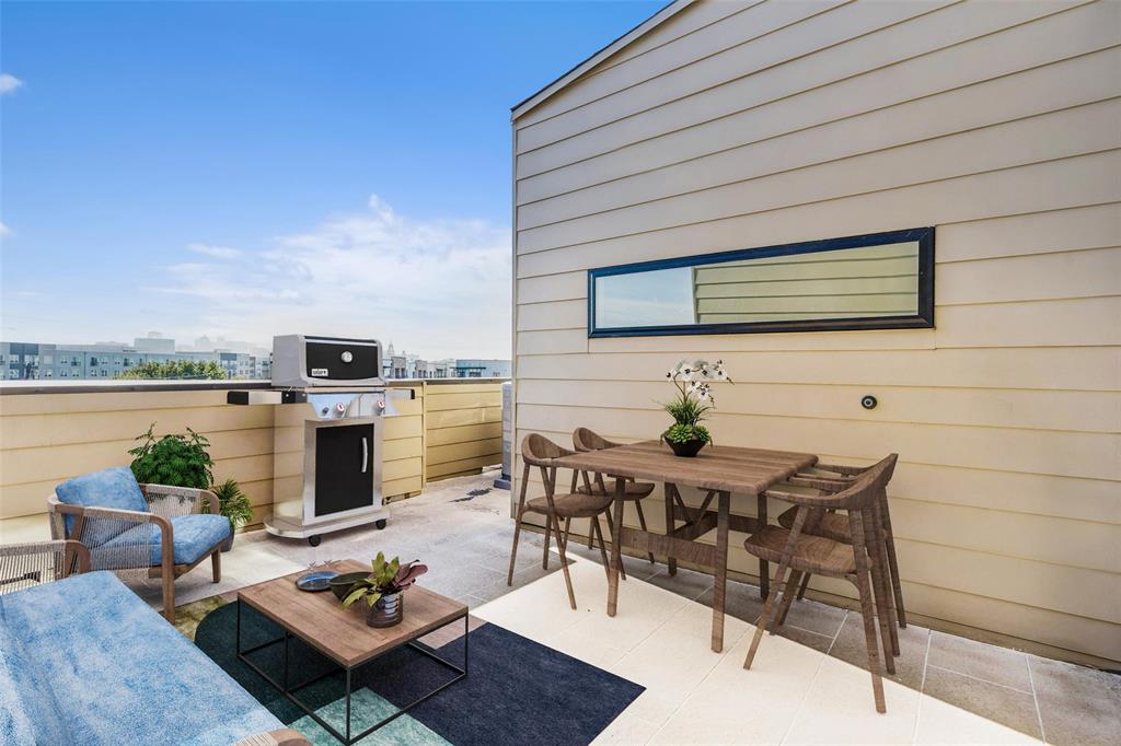 3040 ChImes Street Dallas, TX 75219 - Photo 31 of 38 a view of a outdoor seating area with furniture
