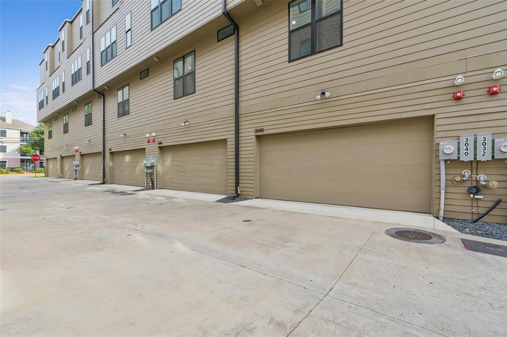 3040 ChImes Street Dallas, TX 75219 - Photo 37 of 38 a view of a house with a patio
