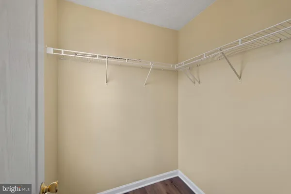 a view of a room with racks on the wall