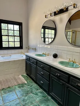 a bathroom with a sink and a bathtub