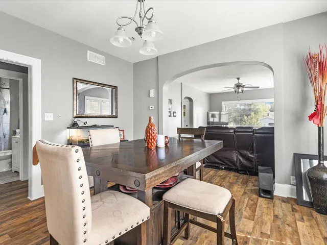 a room with furniture and wooden floor