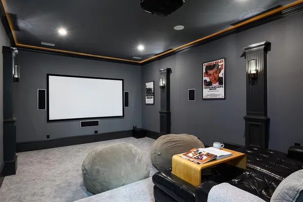 a spacious bedroom with a bed and a couch