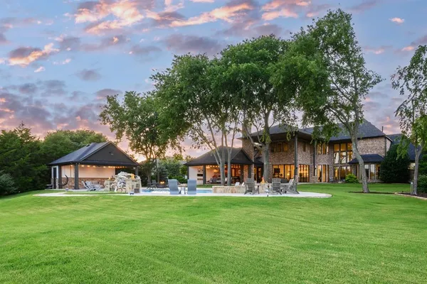 a view of a swimming pool with chairs