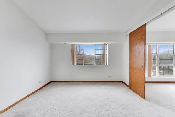 an empty room with windows