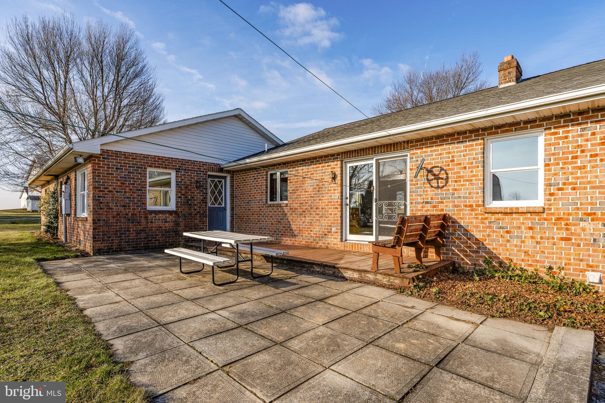 85 Wissler Road Lititz, PA 17543 - Photo 12 of 58 a bench sitting in front of a house