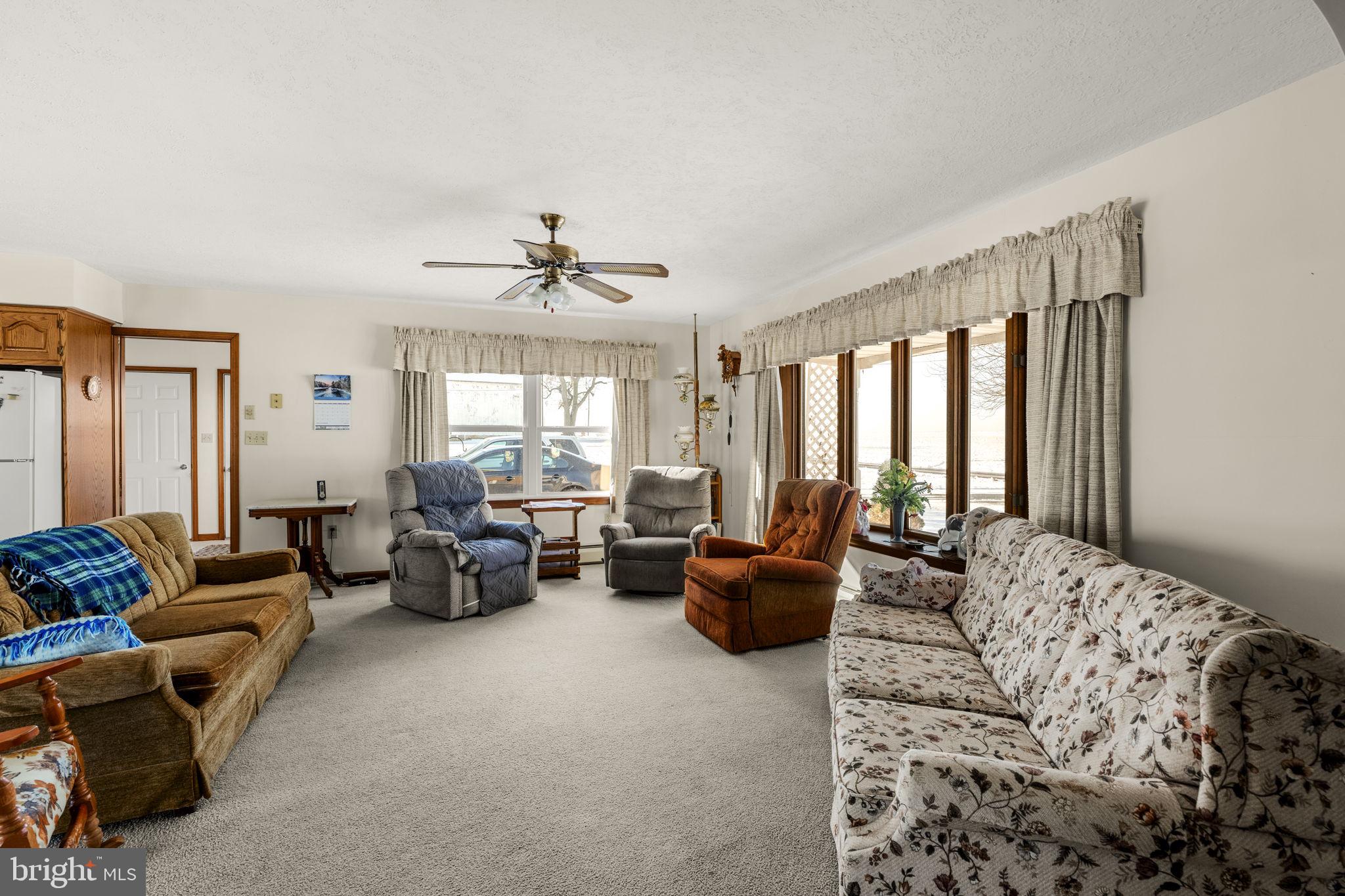 85 Wissler Road Lititz, PA 17543 - Photo 20 of 58 a living room with furniture and a large window
