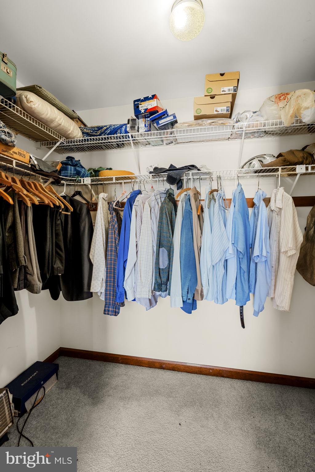85 Wissler Road Lititz, PA 17543 - Photo 38 of 58 a view of walk in closet with clothes and shoes