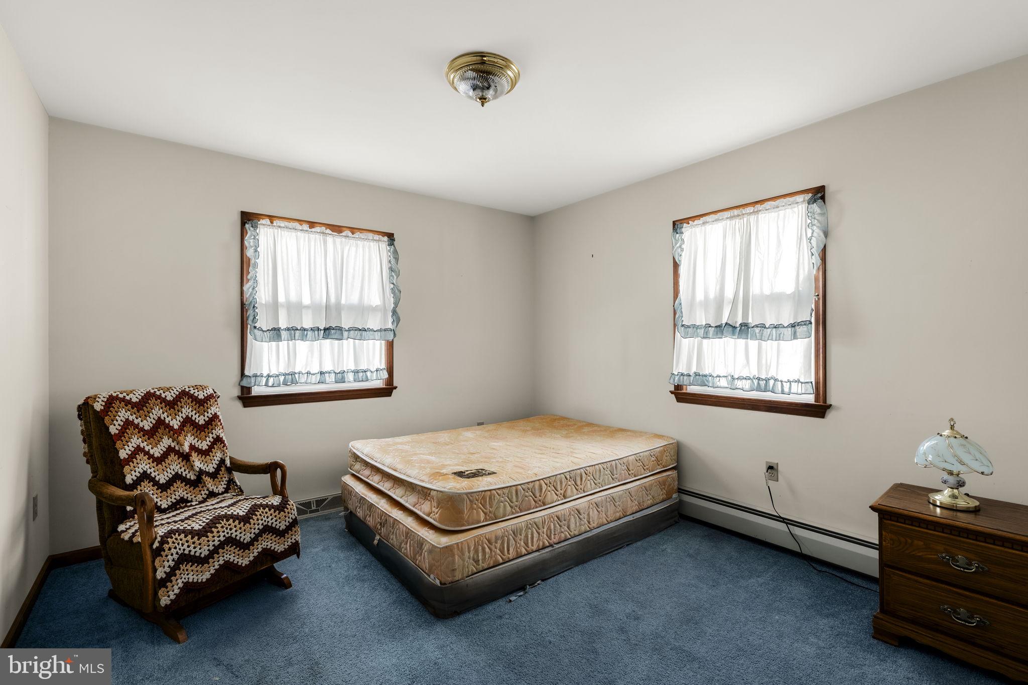 85 Wissler Road Lititz, PA 17543 - Photo 41 of 58 a bedroom with a bed chair and window