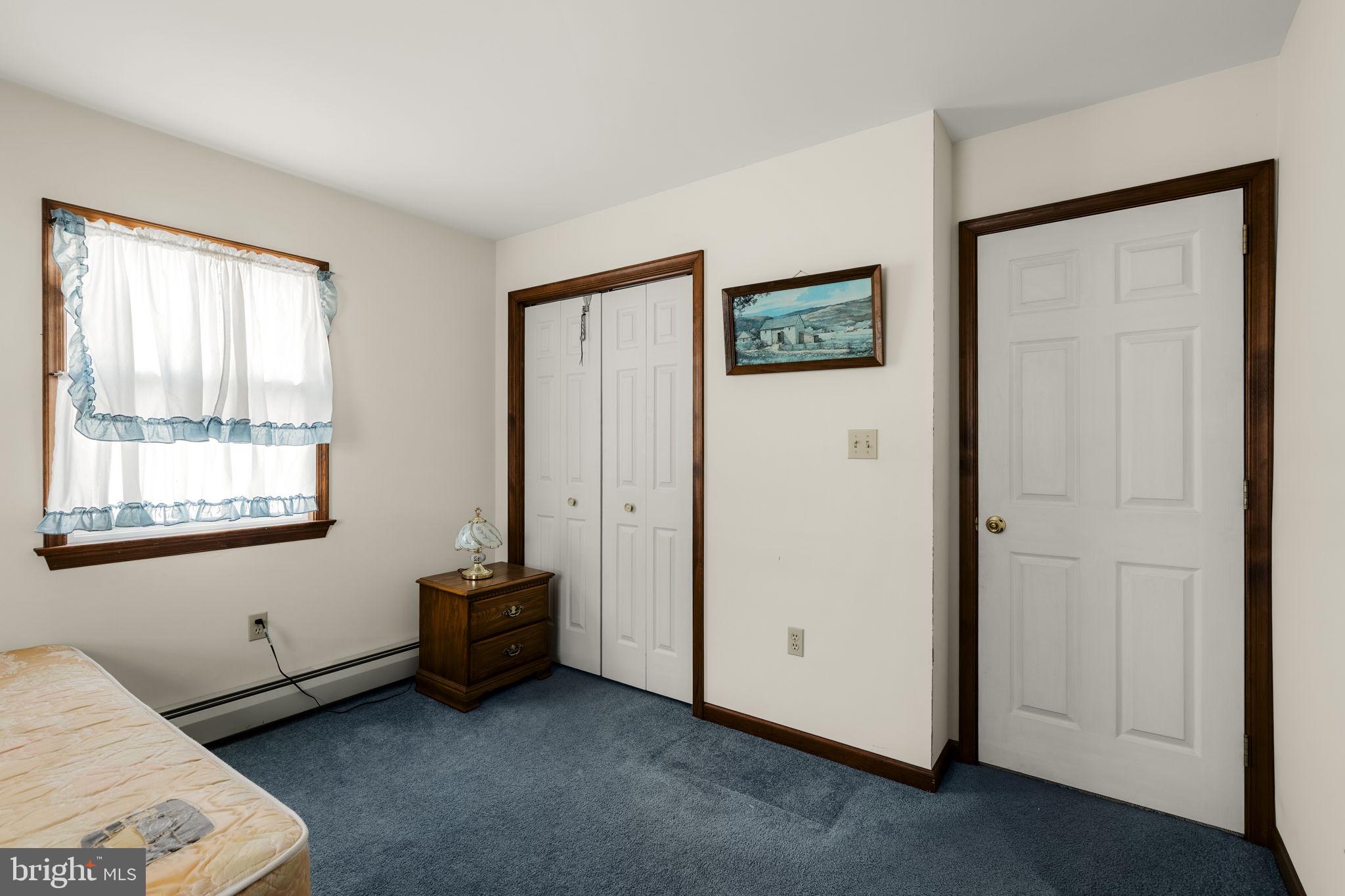 85 Wissler Road Lititz, PA 17543 - Photo 42 of 58 a room with a bed and a window