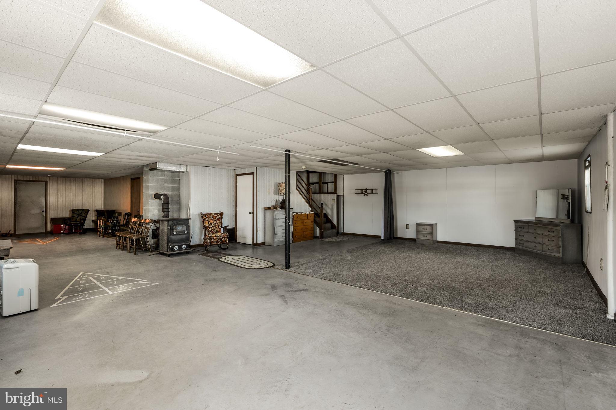85 Wissler Road Lititz, PA 17543 - Photo 46 of 58 a view of a livingroom with gym equipment and a window