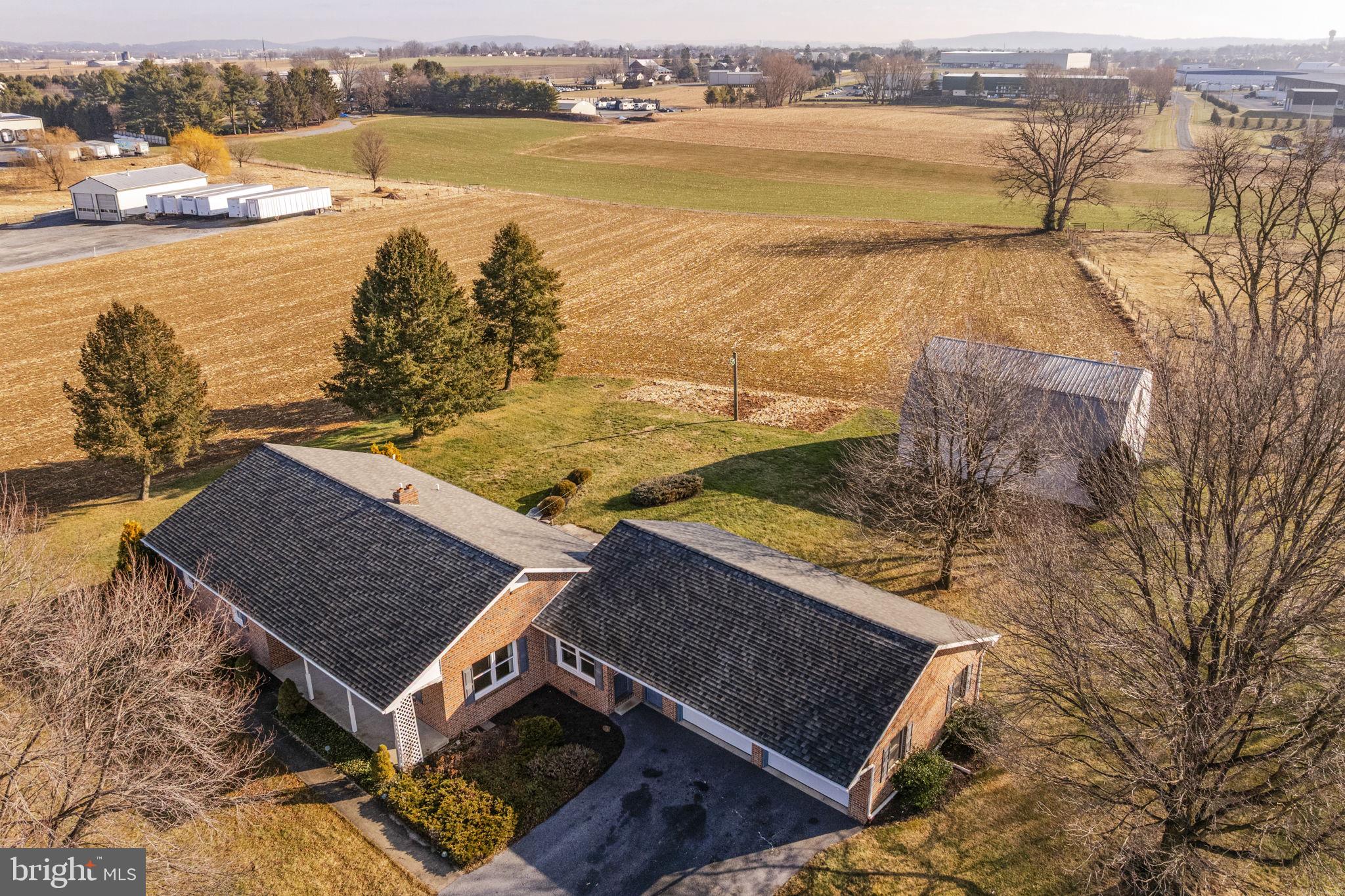 85 Wissler Road Lititz, PA 17543 - Photo 5 of 58 a aerial view of ocean with residential house and outdoor space