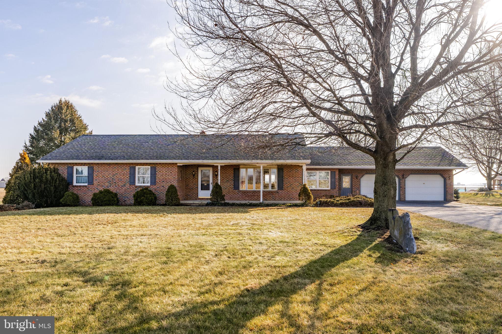 85 Wissler Road Lititz, PA 17543 - Photo 6 of 58 a front view of a house with yard and trees