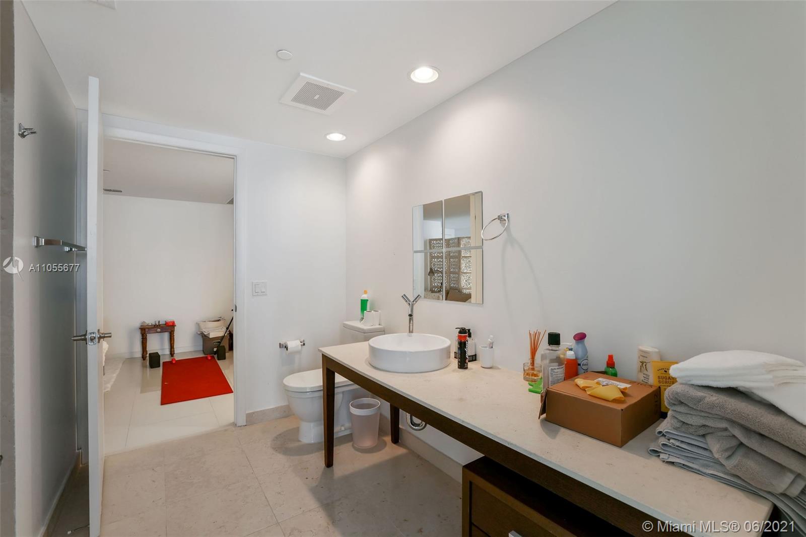 495 Brickell Avenue, Unit 2103 Miami, FL 33131 - Photo 23 of 43 a room with furniture and air hockey table