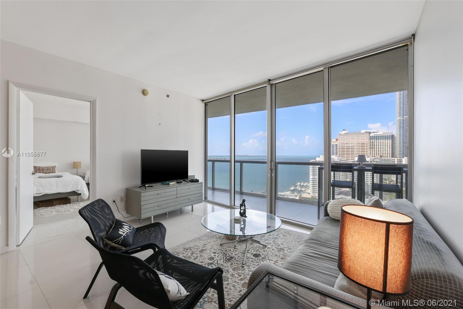 495 Brickell Avenue, Unit 2103 Miami, FL 33131 - Photo 4 of 43 a work room with furniture