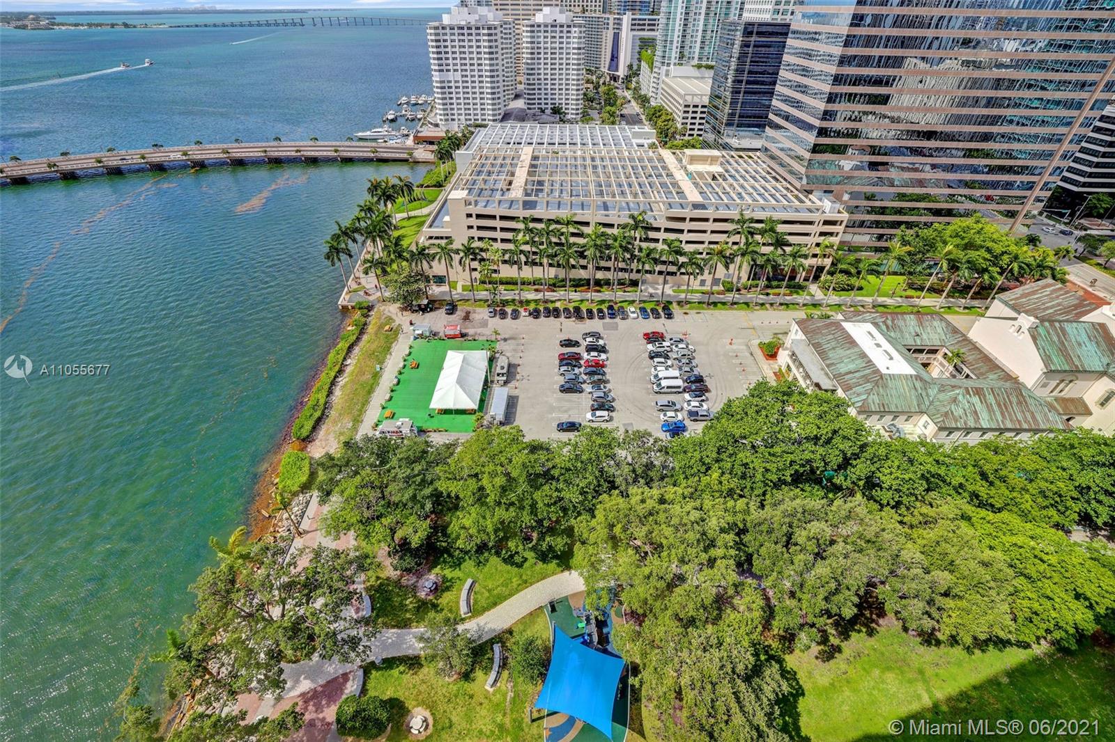 495 Brickell Avenue, Unit 2103 Miami, FL 33131 - Photo 31 of 43 aerial view of a house with a yard and lake view