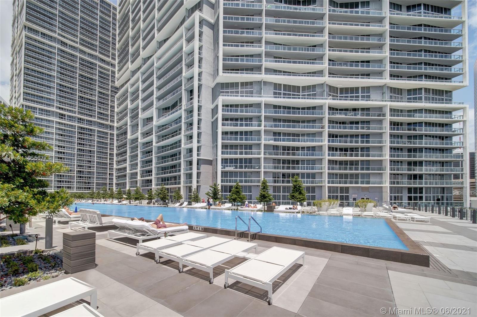 495 Brickell Avenue, Unit 2103 Miami, FL 33131 - Photo 42 of 43 a swimming pool with outdoor seating