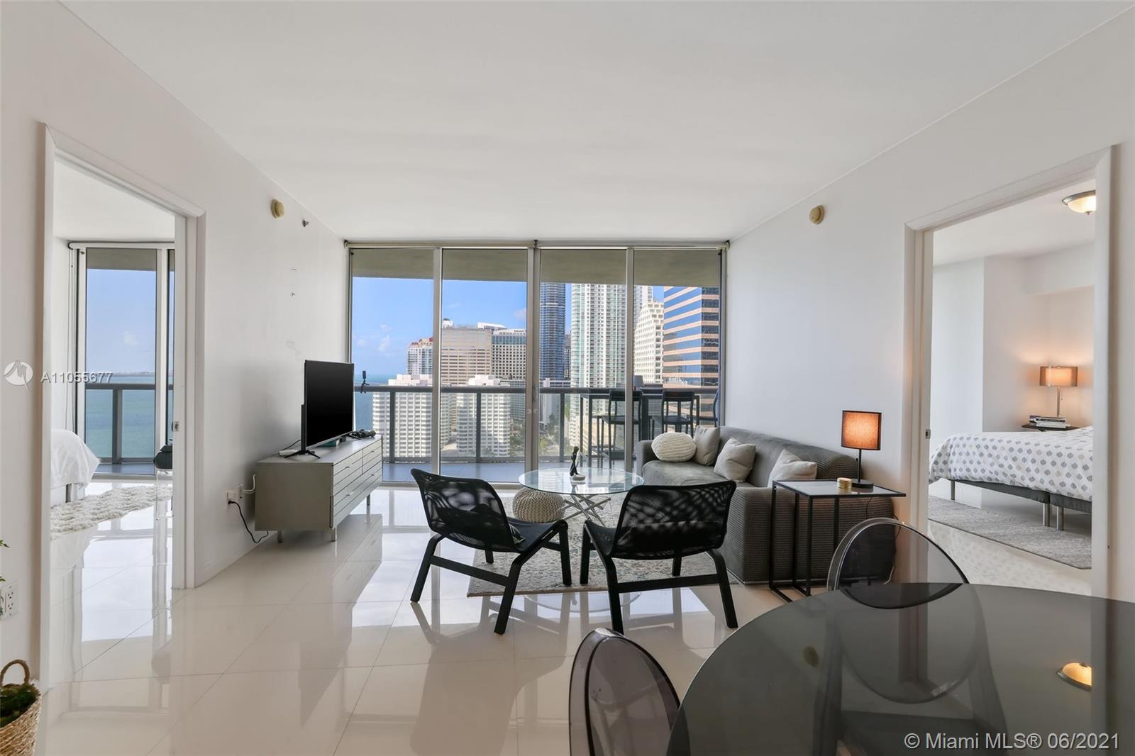 495 Brickell Avenue, Unit 2103 Miami, FL 33131 - Photo 6 of 43 a living room with furniture and a table