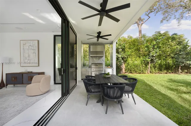 an aerial view of residential house with outdoor space and parking