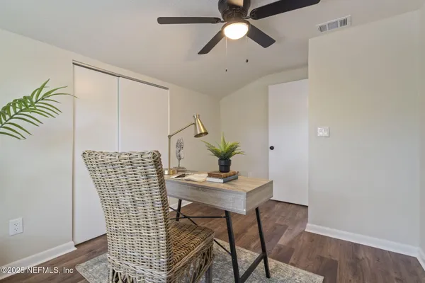a view of a dining room with furniture