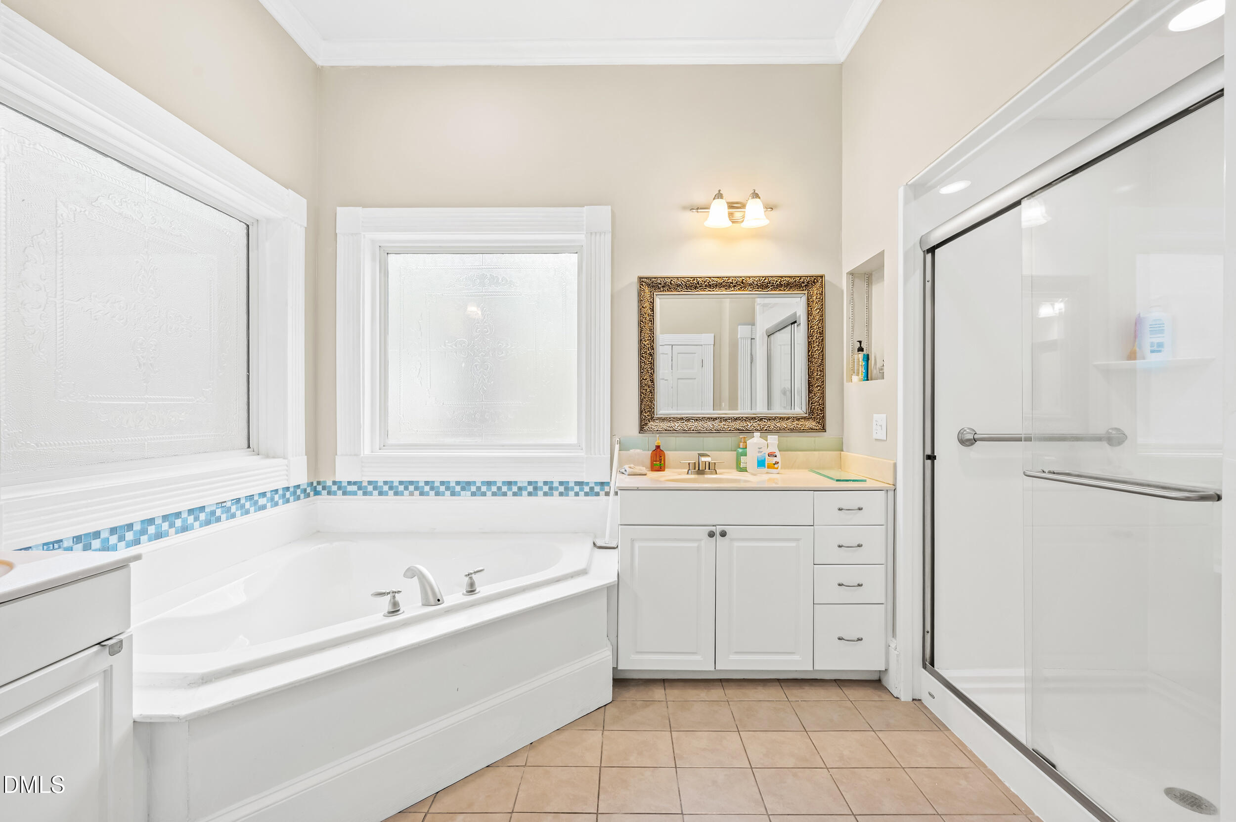 1957 Hilltop Road Raleigh, NC 27610 - Photo 19 of 46 a bathroom with a bathtub and a sink