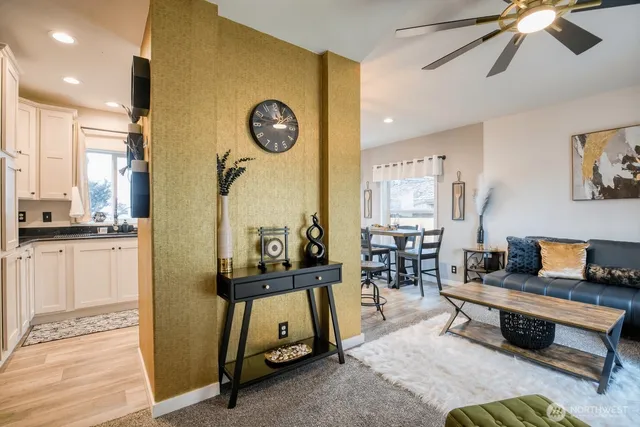 a living room with furniture and a table