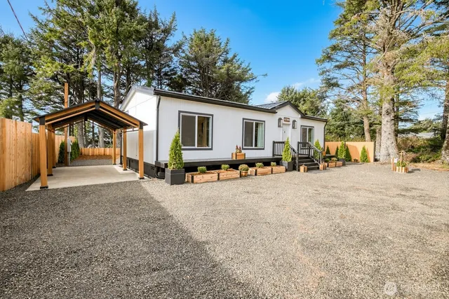 a house with trees in front of it