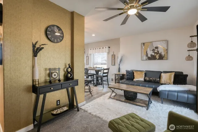 a living room with furniture and a window
