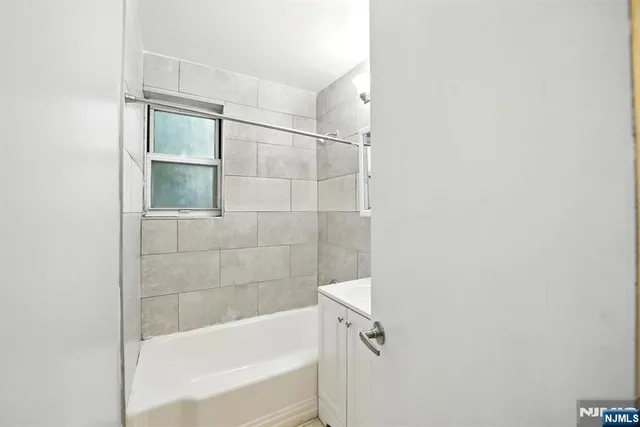 a bathroom with a bathtub