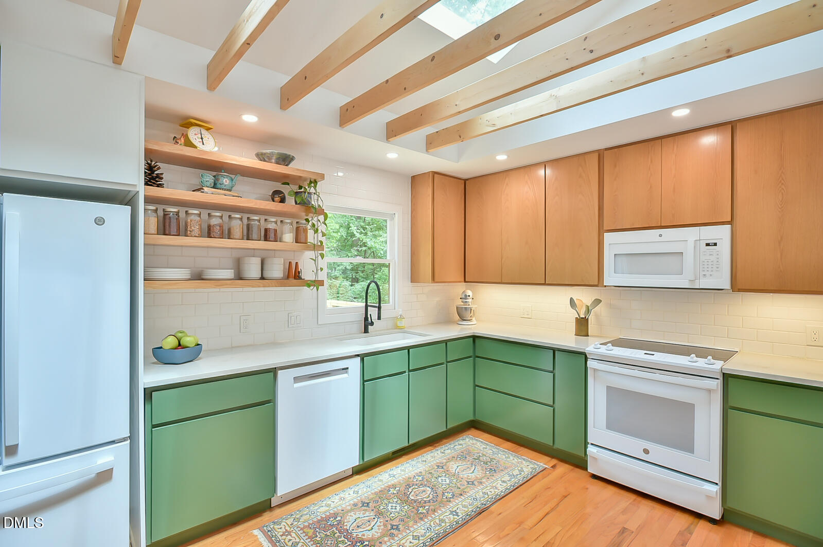 1626 Rowemont Drive Durham, NC 27705 - Photo 11 of 45 a kitchen with a sink and cabinets