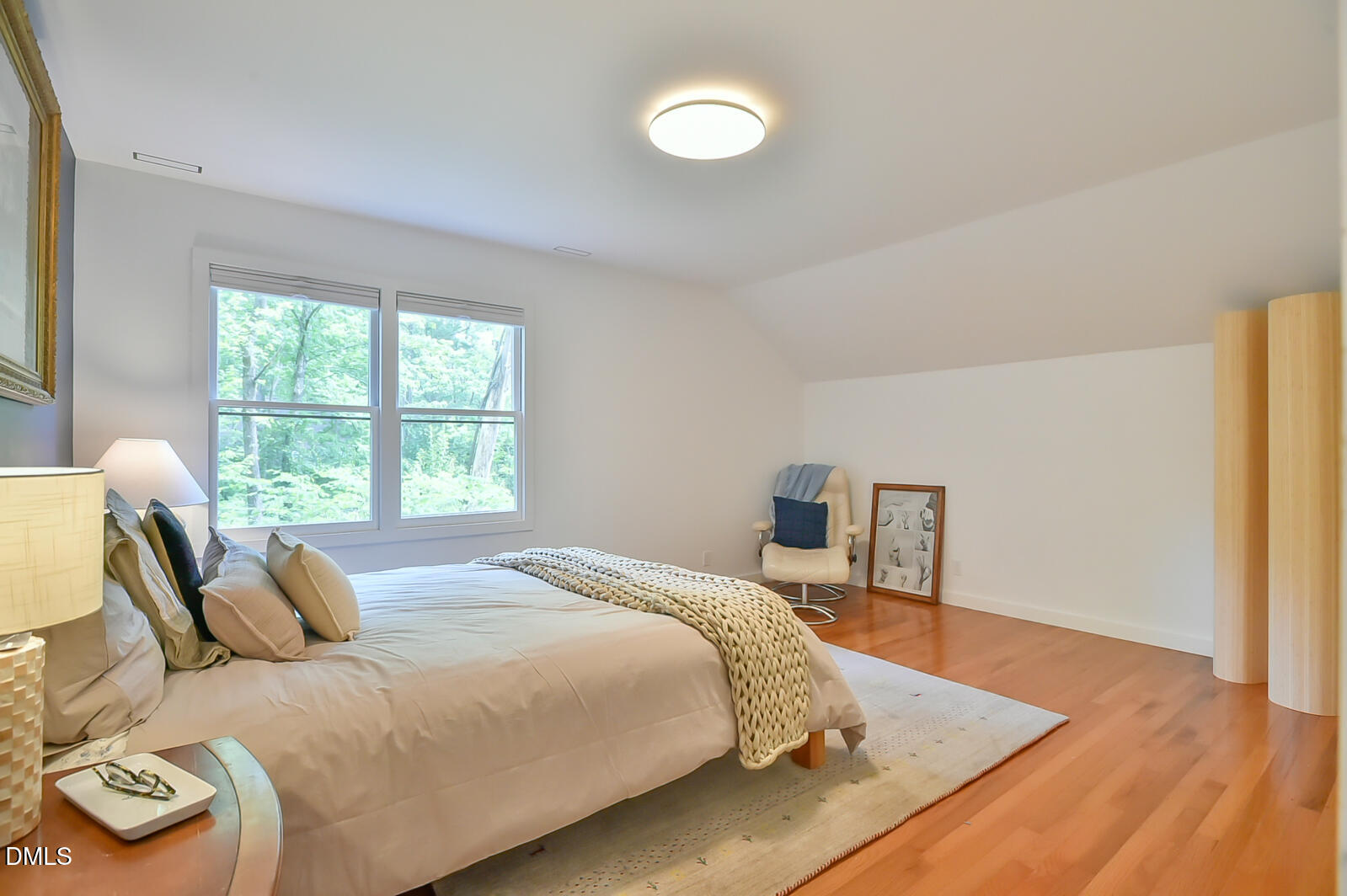 1626 Rowemont Drive Durham, NC 27705 - Photo 19 of 45 a bedroom with a bed and a window
