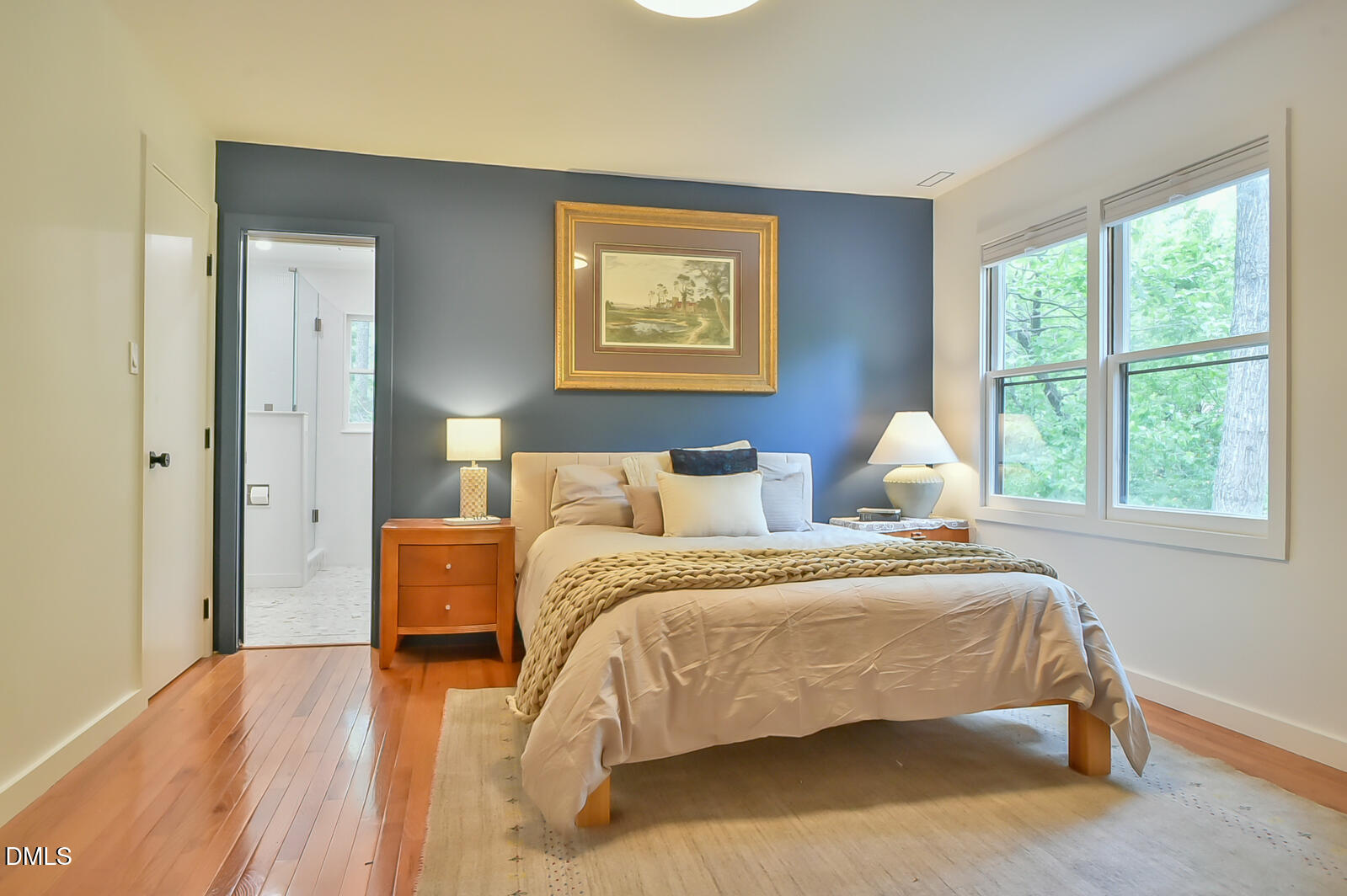 1626 Rowemont Drive Durham, NC 27705 - Photo 20 of 45 a bedroom with a bed and a window