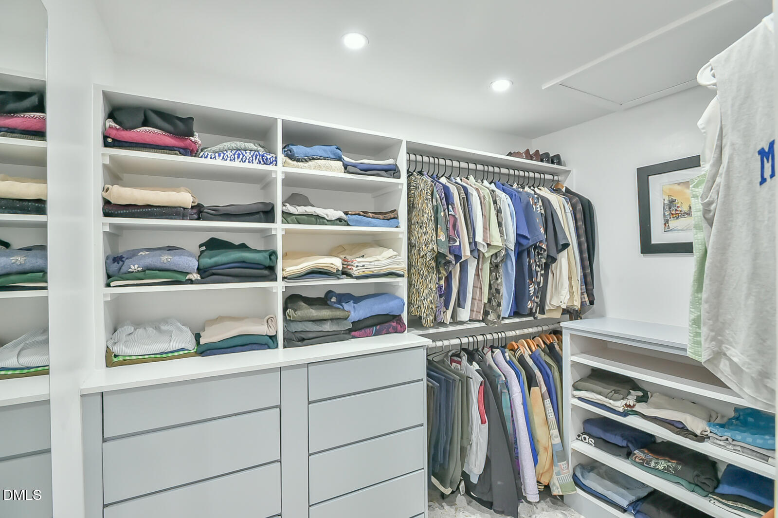 1626 Rowemont Drive Durham, NC 27705 - Photo 24 of 45 a view of walk in closet with clothes and shoes